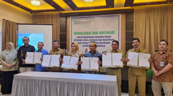 Dinas Sosial dan Pemberdayaan Masyarakat (Dinsos PM) Kota Gorontalo saat menjalin kerjasama dengan Badan Penyelenggara Jaminan Sosial (BPJS) kesehatan. (Foto: Humas Pemkot Gorontalo)