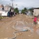 Kondisi Jalan di Kelurahan Tenilo, Kota Gorontalo pasca diterjang banjir dan diminta untuk segera dibersihkan/Hibata.id