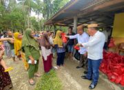 Pasangan IRIS Serahkan Bantuan bagi Korban Banjir dan Longsor di Suwawa