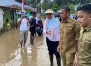 Bupati Merlan S. Uloli Pastikan Penanganan Banjir dan Bantuan Warga Berjalan Lancar/Hibata.id