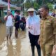 Bupati Merlan S. Uloli Pastikan Penanganan Banjir dan Bantuan Warga Berjalan Lancar/Hibata.id