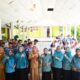 TP PKK Kota Gorontalo saat menggelar Program Go To School. (Foto: Humas Pemkot Gorontalo)
