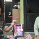 Serka Hendri, anggota Kodim Deli Serdang, tak dapat menyembunyikan kebahagiaannya setelah anak sulungnya, Rendi Arif Pratama, berhasil lolos seleksi Bintara Polri Tahun Anggaran 2024/Hibata.id