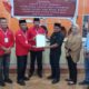 Ridwan Yasin dan Muksin Badar resmi ditetapkan jadi Cakada Gorut dalam Pleno KPU. Sabtu (5/10). Foto: Dok KPU/Hibata.id