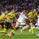 Penyerang Real Madrid Kylian Mbappe menembus pertahanan Dortmund di Liga Champions, Rabu (23/10) dini hari WIB. (REUTERS/Susana Vera)/Hibata.id
