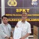 Ismet Mile saat melaporkan YA di Polres Bone Bolango. (Foto: Humas Pemkot Gorontalo)