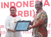 Bupati Bone Bolango, Merlan S. Uloli, mendapatkan penghargaan prestisius sebagai Gender Champion dari Pemerintah Provinsi Gorontalo/Hibata.id