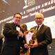 Pj. Gubernur Gorontalo, Rudy Salahuddin (kanan), menerima penghargaan Indonesia Top Hospitality Leader dari Presiden ITTA Foundation, Panca Rudolf Sarungu, pada 15th Indonesia Travel Tourism Award 2024/2025 di Swissotel Jakarta Pik Avenue, Selasa (17/12/2024)/Diskominfotik/Hibata.id