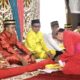 Pj saat Wali Kota Gorontalo, Ismail Madjid mengikuti prosesi adat Modepito. (Foto: Humas Pemkot Gorontalo)