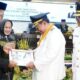 Ismail Madjid saat mengikuti sidang paripurna serah terima jabatan (Sertijab) yang diselenggarakan oleh DPRD Kota Gorontalo, Senin (3/3/2025). (Foto: Humas Pemkot Gorontalo)