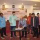 Bupati Ismet Mile saat menghadiri sekaligus membuka kegiatan rapat koordinasi antarinstansi dan DKT penyusunan modul dalam rangka revitalisasi Bahasa Suwawa tahun 2025, di Fox Hotel, Kota Gorontalo, Kamis (15/5/2025). (F.AKP)/Hibata.id