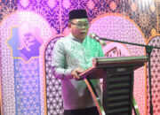 Wabup Risman Tolingguhu saat memberikan sambutan sekaligus membuka secara resmi pelaksanaan STQH ke-XI tingkat Kabupaten Bone Bolango tahun 2025, di Pelataran Masjid Baitul Haq Islamic Center Bone Bolango, Kamis (22/5/2025) malam. (F.AKP)