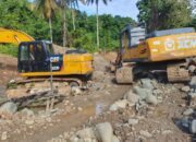 Alat berat yang sempat di segal di PETI Sungai Dopalak. Tetapi, segel yang dipasang Polres Buol kini telah dilepas. (Foto: Hibata.id)