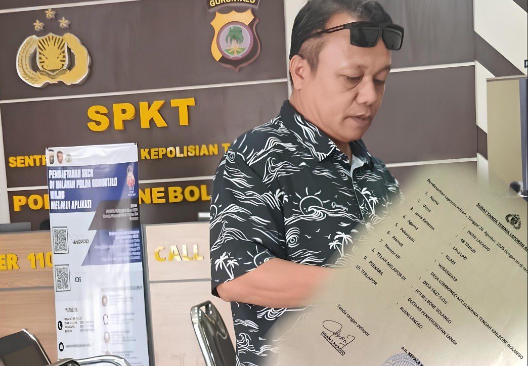 Iwan Lakadjo saat melaporkan di Polres Bone Bolango/Hibata.id
