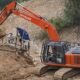 Satu unit alat berat jenis excavator tengah beroperasi di jantung area tambang ilegal Desa Teratai, Kecamatan Marisa, Kabupaten Pohuwato, Provinsi Gorontalo. (Foto: Dok. Hibata.id(Ai)