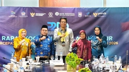 Sekda Kabupaten Gorontalo Sugondo Makmur menghadiri Rakorwil P2DD 2026 di Kantor BI Gorontalo untuk mempercepat digitalisasi keuangan daerah/Hibata.id