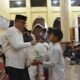 Wakil Bupati Boalemo Lahmuddin Hambali menghadiri peringatan Malam Nuzulul Quran di Masjid Agung Baiturrahmah Tilamuta sekaligus menyalurkan bantuan Ramadhan melalui Baznas kepada masyarakat/Hibata.id