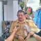 Kepala Dinas Perdagangan, Koperasi, dan UKM Kota Kotamobagu, Ariono Potabuga saat diwawancarai media. (Foto: Istw)