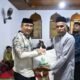 Pemkab Boalemo melaksanakan Tarawih Keliling malam ke-22 Ramadan di Masjid Al-Mukarramah Desa Mohungo. Wakil Bupati Lahmudin Hambali menyerahkan bantuan Baznas kepada warga yang membutuhkan/Hibata.id