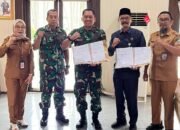 Pemda Bolmut Gandeng Kodim 1303 Percepat Pembangunan Rumah Layak Huni