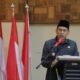 Wali Kota, Weny Gaib saat memberikan sambutan di rapat evaluasi kinerja aparatur desa dan kelurahan. (Foto: Humas Pemkot Kotamobagu)
