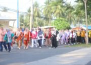 Alun-Alun Bone Bolango penuh tawa saat ribuan warga ikut jalan sehat, senam, dan layanan gratis di HUT ke-23 Bone Bolango dan Hardiknas 2026/Hibata.id
