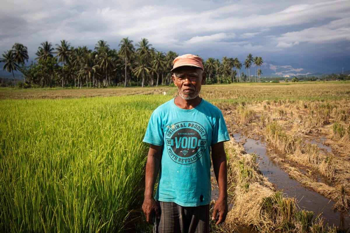Darwin Djafar, petani di Pohuwato yang kerap merugi akibat saluran irigasi yang terganggu sedimentasi. Foto: Sarjan Lahay/Mongabay Indonesia.