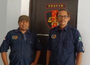 Ramdan didampingi Ketua Dewan Kehormatan Persatuan Wartawan Indonesia (PWI) Sulawesi Utara, Satrin Lasama saat melapor/Hibata.id