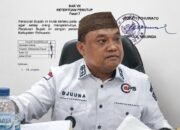 Plh Sekretaris Daerah Pohuwato, Achmad Djuuna. Foto: Kolase AI/Delpri/Hibata.id