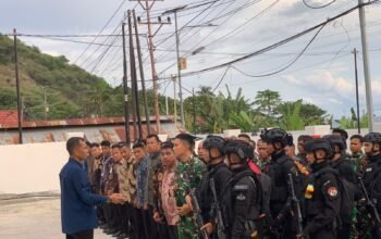 Kapten Zainal Arifin memimpin apel kesiagaan pengamanan menjelang kedatangan Presiden Republik Indonesia, Prabowo Subianto, di kawasan KNMP Provinsi Gorontalo, Jumat (08/05/2026)/Hibata.id
