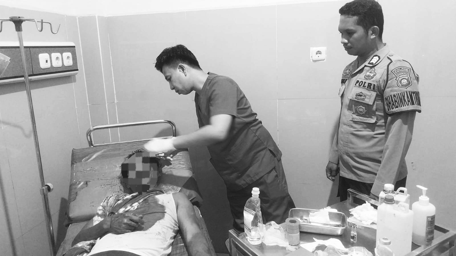 Seorang aparatur sipil negara (ASN) di Desa Marisa Selatan, Kecamatan Marisa, Kabupaten Pohuwato yang diduga mendapatkan penganiayaan. (Foto: Istw)