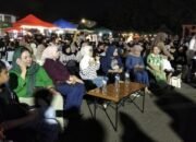 Suasana Kopi Street di halaman Kampus Universitas Dumoga Kotamobagu tampak lebih ramai dari biasanya pada Sabtu malam, 23 Mei 2026. (Foto: Humas Pemkot Kotamobagu)