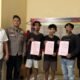 Tiga tersangka kasus dugaan Pertambangan Emas Tanpa Izin (PETI) di Desa Teratai menerima surat penetapan tersangka dari penyidik Satreskrim Polres Pohuwato, Senin (29/6/2026)/Hibata.id