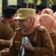 Kepala Desa Toto Utara nonaktif sementara, Ramla Djafar, dalam salah satu kegiatan bersama Pemerintah Kabupaten Bone Bolango. Foto: Dok. Pribadi/Hibata.id