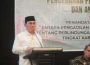 Sekretaris Daerah Bone Bolango, Iwan Mustapa saat Rapat Koordinasi Dan Kerjasama Lintas Sektor Pencegahan Dan Penanganan Perkawinan Anak, Pekerja Anak Dan Anak Tidak Sekolah (ATS) yang diselenggarakan di Hotel Grand Q Kota Gorontalo, Kamis (2/7).