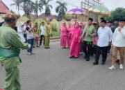 Bupati Boalemo Rum Pagau menyambut Kapolres Boalemo AKBP Firman Taufik melalui prosesi adat Mopotilolo/Hibata.id