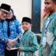 Wakil Wali Kota Gorontalo, Indra Gobel, mewakili Wali Kota Adhan Dambea secara resmi melepas keberangkatan Kafilah Kota Gorontalo yang akan berlaga pada Musabaqah Tilawatil Qur’an (MTQ) Tingkat Provinsi Gorontalo. (Foto: Humas)