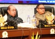 Wali Kota Gorontalo Adhan Dambea dalam Rapat Paripurna DPRD Kota Gorontalo saat memaparkan Rancangan Kebijakan Umum Anggaran dan Prioritas Plafon Anggaran Sementara (RKUA-PPAS) APBD Tahun Anggaran 2027. (Foto: Humas)