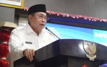 Wali Kota Gorontalo Adhan Dambea dalam Rapat Paripurna DPRD Kota Gorontalo yang mengagendakan penandatanganan Nota Kesepakatan Kebijakan Umum Anggaran (KUA) dan Prioritas Plafon Anggaran Sementara (PPAS) Tahun Anggaran 2027, Rabu, 29 Juli 2026. (Foto: Humas)
