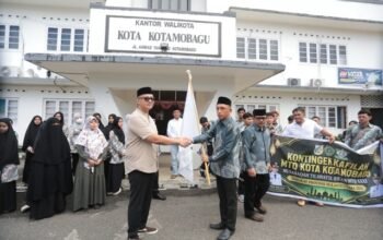 Sekretaris Daerah Kota Kotamobagu, Sofyan Mokoginta, secara resmi melepas Kafilah Kota Kotamobagu yang akan mengikuti Musabaqah Tilawatil Qur’an (MTQ) ke-31 Tingkat Provinsi Sulawesi Utara Tahun 2026. (Foto: Humas)