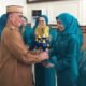 Bupati Bone Bolango, Ismet Mile pada Acara Puncak HKG PKK ke-54 tingkat Kabupaten Bone Bolango tahun 2026 di Aula BPMP Provinsi Gorontalo, Senin (6/7/2026). (F.Indra/Diskominfo)/Hibata.id