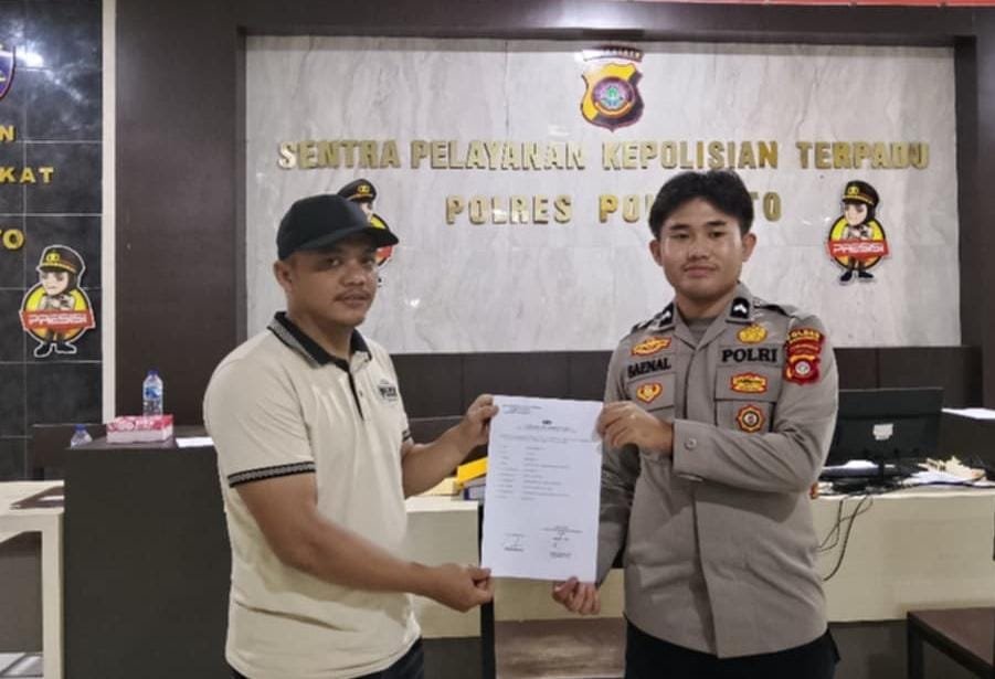 Eks Kepala Desa Yipilo Pandris Mbuinga melaporkan dugaan pencemaran nama baik melalui media sosial dan WhatsApp ke Polres Pohuwato/Hibata.id