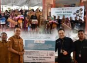 Penyaluran bantuan ATENSI tahap terbaru dilakukan secara simbolis oleh Wakil Bupati Boalemo, Lahmuddin Hambali, di halaman Kantor Dinas Sosial PMD Kabupaten Boalemo, Selasa, 28 Juli 2026. (Foto: Humas)