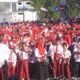 Pemkab Bone Bolango mengawali HUT Ke-81 RI dengan pembagian dan pembentangan Bendera Merah Putih sepanjang 50 meter untuk memperkuat nasionalisme. Foto: Prokofim/Hibata.id