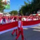 Bupati Bone Bolango Ismet Mile bersama jajaran Forkopimda memimpin pembentangan Bendera Merah Putih sepanjang 50 meter di Centerpoint Bone Bolango sebagai pembuka rangkaian peringatan HUT Ke-81 Kemerdekaan RI, Senin (3/8/2026)/Hibata.id