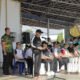 Wali Kota Kotamobagu Weny Gaib memimpin Gerakan Pembagian 10 Juta Bendera Merah Putih dalam rangka menyambut Hari Ulang Tahun ke-81 Kemerdekaan Republik Indonesia. (Foto: Humas)