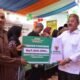 Bupati Boalemo Rum Pagau menyerahkan bantuan BAZNAS kepada mustahik dan mengapresiasi peran lembaga tersebut dalam membantu masyarakat yang membutuhkan/Hibata.id
