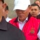 Salah satu tersangka dugaan korupsi dana hibah KONI Gorontalo saat digiring petugas menuju kendaraan tahanan, Jumat (21/8/2026)/Hibata.id