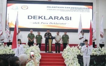 Wali Kota Kotamobagu Weny Gaib menghadiri pelantikan dan pengukuhan Dewan Pimpinan Daerah Asosiasi Satuan Perlindungan Masyarakat (DPD Aslinmas). (Foto: Humas)