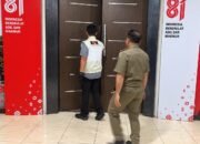 Penyidik Komisi Pemberantasan Korupsi melakukan penggeledahan di lingkungan Pemerintah Kabupaten Bolaang Mongondow Utara, Senin (28/9/2026)/Hibata.id